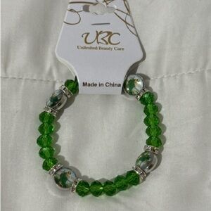 NWT. Unisex elastic saint Jude.Cristal bracelet